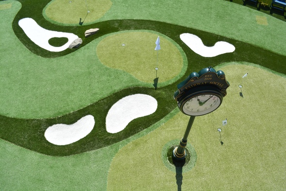 Huntsville Synthetic grass golf course with sand traps and golfers